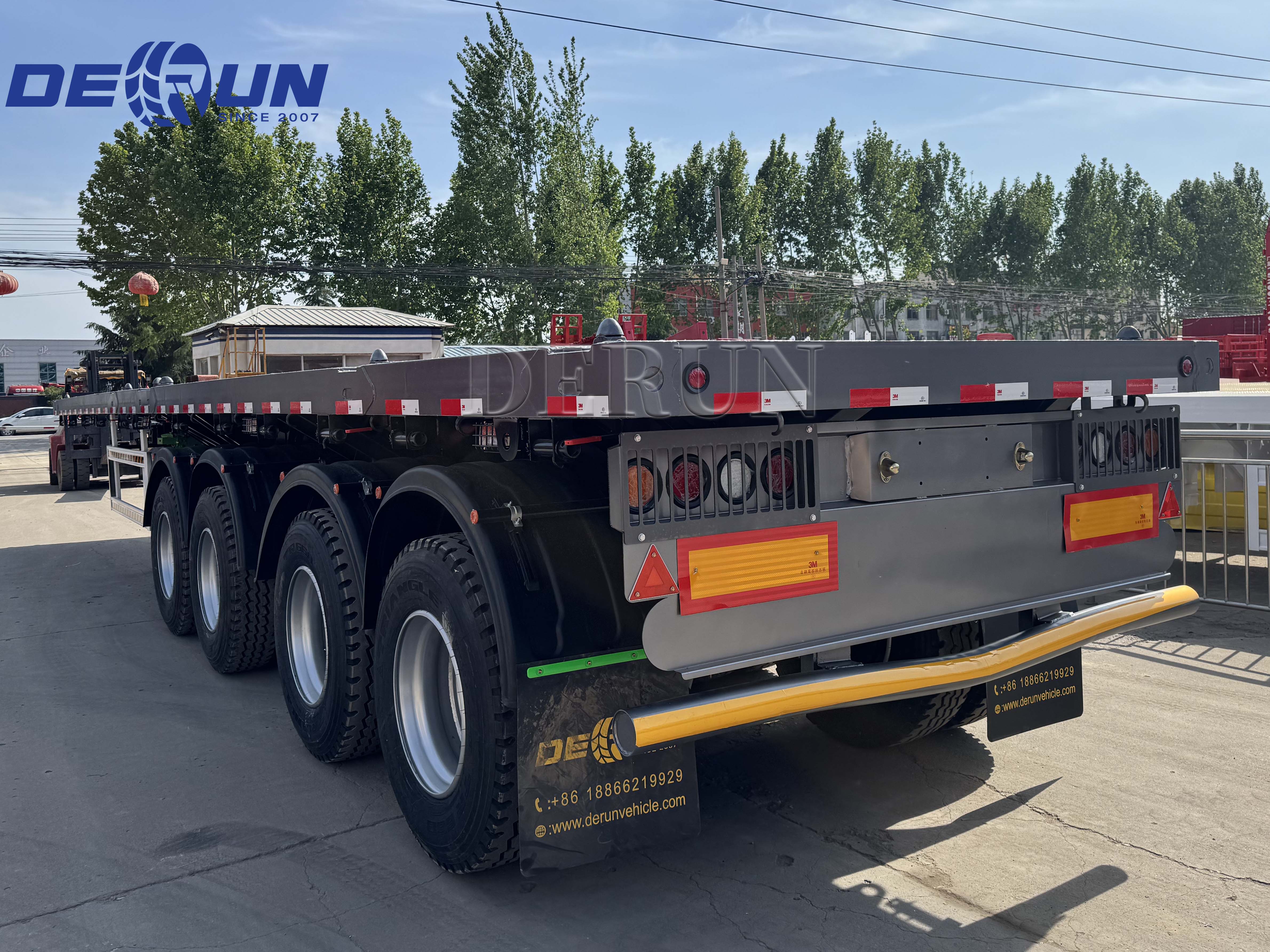 Four 4-axle flatbed semi-trailers will be sent to Ghana.